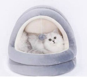 Purple hooded dog bed with soft plush interior.